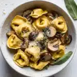 Cheese Tortellini with Butter, Mushrooms, and Crispy Sage Recipe