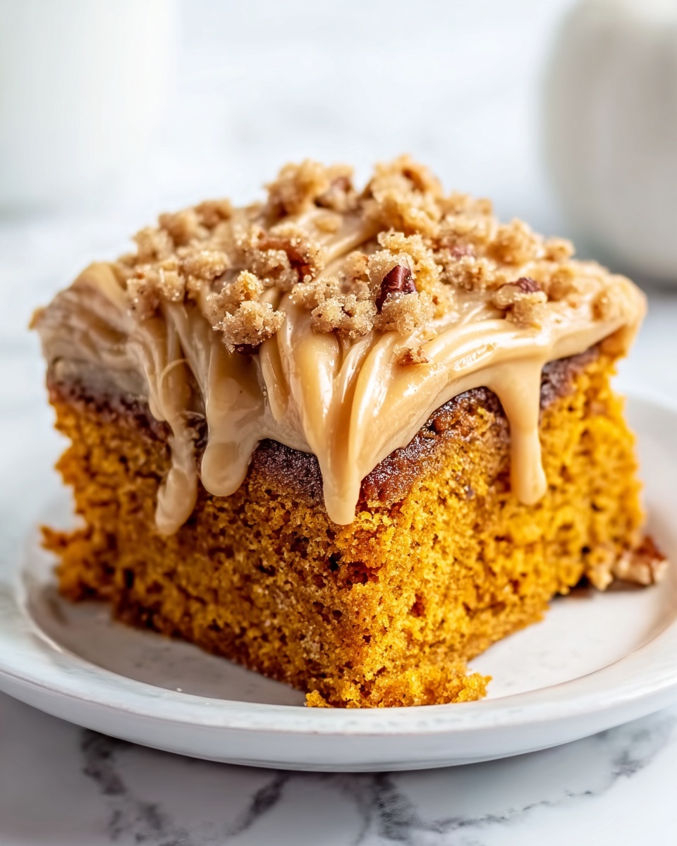 A square piece of spongy pumpkin cake with a light orange color sits centered on a white plate. The cake has two visible layers: the bottom layer is a moist pumpkin cake, and the top layer is a thick swirl of creamy beige frosting. The frosting is smoothly spread on top and dripping generously down the sides. The cake is topped with small bits of crunchy pecans covering the frosting. The background is a white marbled surface with soft natural light. Photo taken with an iphone --ar 4:5 --v 7