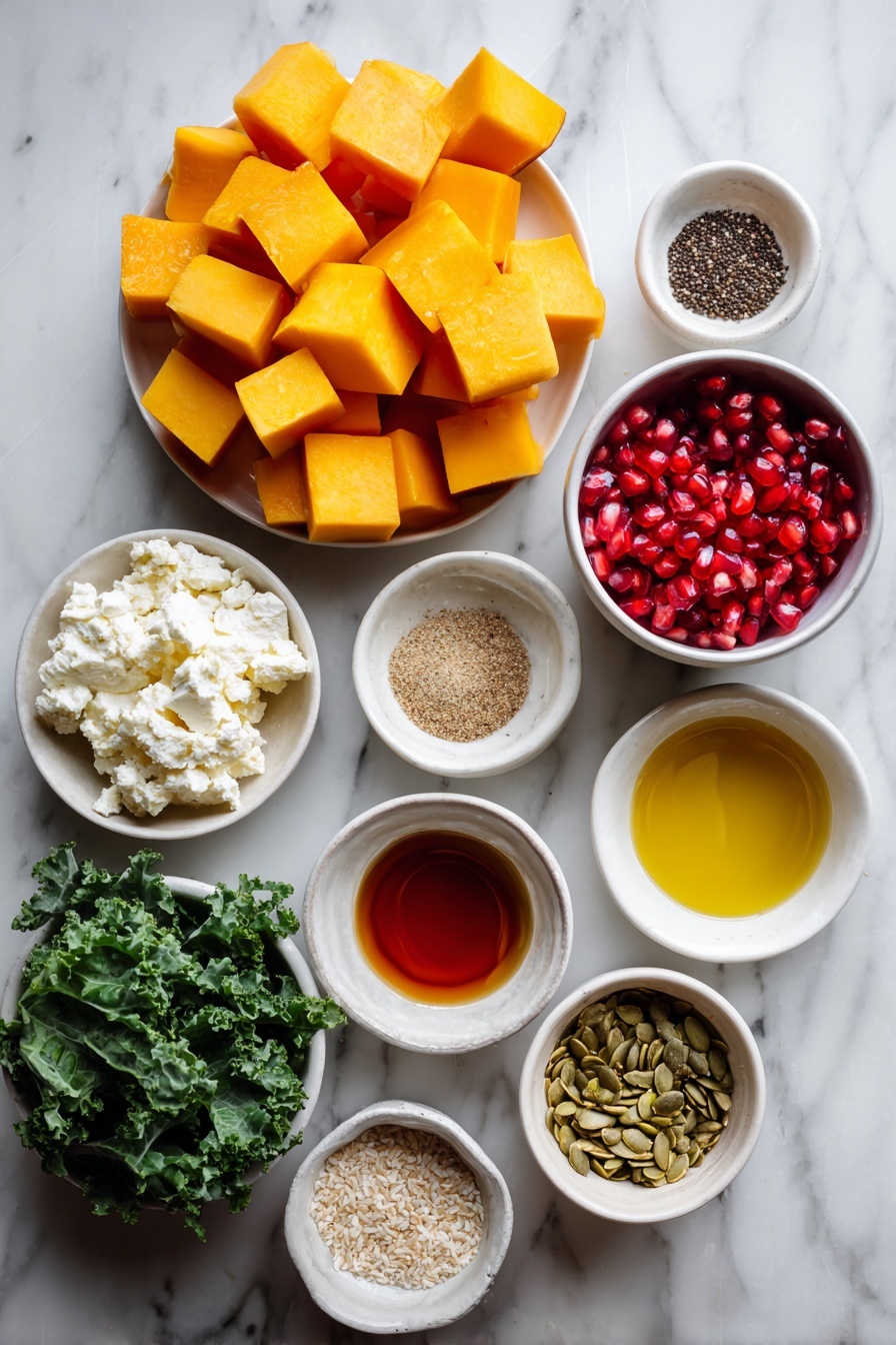 Flat lay of a small pile of cubed butternut squash, a medium red apple sliced into chunks, a handful of baby kale leaves, a small white ceramic bowl of ruby red pomegranate seeds, a small white ceramic bowl of crumbled white feta cheese, a small white ceramic bowl of toasted pepitas, two whole brown eggs with clean shells, a small white ceramic bowl with golden olive oil, a small white ceramic bowl with amber apple cider vinegar, and a small white ceramic bowl holding grainy Dijon mustard, small white ceramic bowls containing light brown Italian seasoning, fine white garlic powder, coarse white salt, and black peppercorns placed symmetrically on a clean white marble surface, soft natural light, photo taken with an iPhone, professional food photography style, fresh ingredients, white ceramic bowls, no bottles, no duplicates, no utensils, no packaging --ar 2:3 --v 7 --p m7354615311229779997 - Fall Butternut Squash Apple Salad, autumn squash apple salad, seasonal fall salad with butternut squash, healthy fall salad recipes, easy autumn vegetable salad