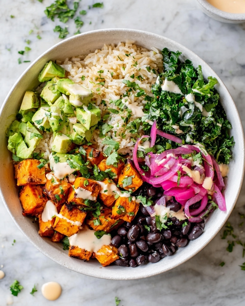 A white bowl filled with five layers arranged side-by-side: light brown cooked rice topped with green herbs on the top left; small green avocado cubes with bright green herbs on the bottom left; orange-roasted cubes of sweet potato with green herbs and a light creamy sauce drizzled over them below the rice and avocado; thin slices of pink and white pickled red onion on a bed of dark green leafy kale in the middle right; and a small pile of shiny black beans at the bottom right. The bowl rests on a white marbled surface with some green herb bits and a few drops of the creamy sauce around it. photo taken with an iphone --ar 4:5 --v 7