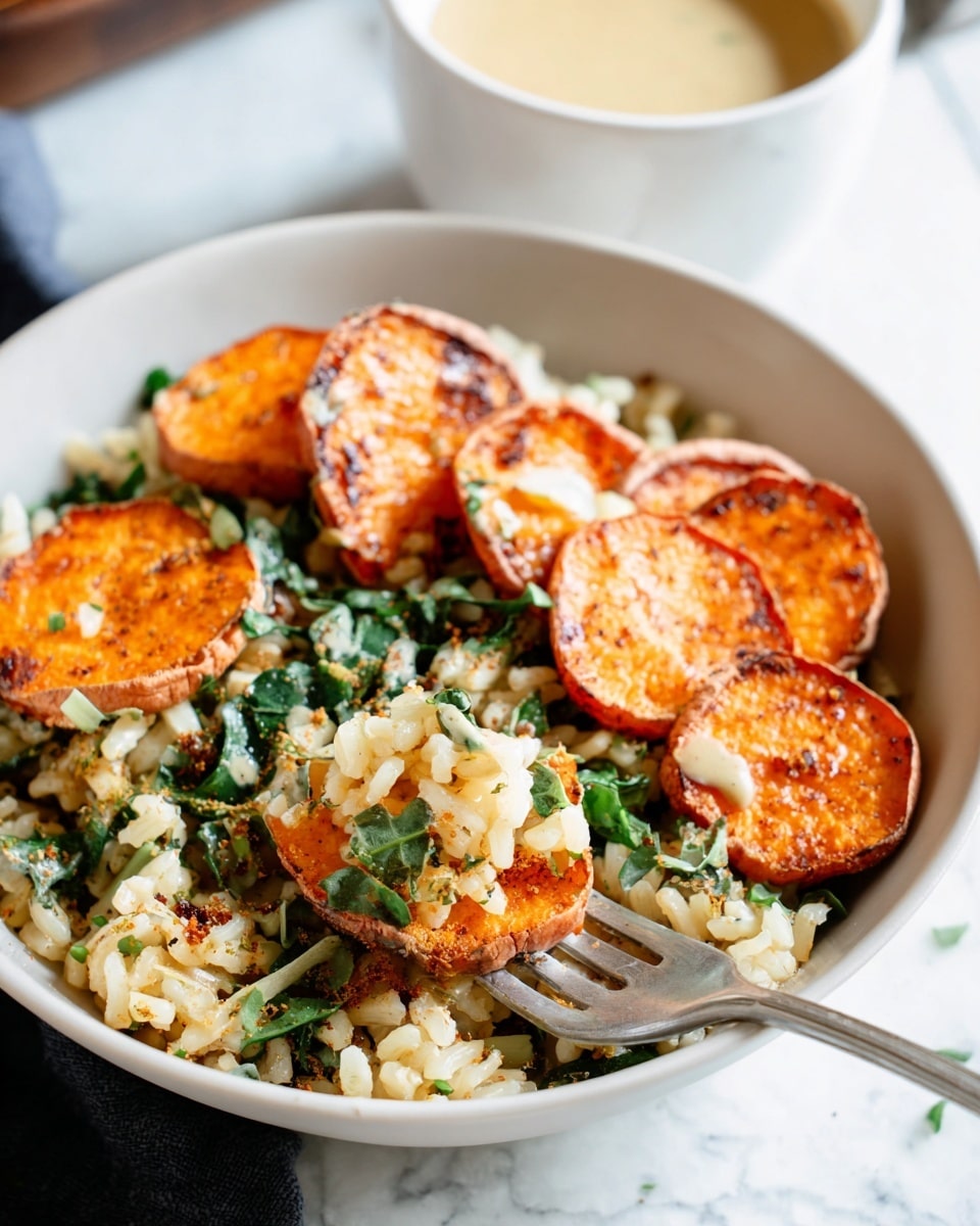 A white bowl filled with a mix of cooked rice and green leafy herbs forms the base layer with a soft texture. On top, several slices of crispy, bright orange sweet potatoes are scattered, adding a slightly charred look and crunchy texture. In the background, a small white cup filled with a creamy beige sauce is visible. In the foreground, a silver fork holds a bite showing a piece of sweet potato, rice grains, and green herbs together. The whole scene is set on a white marbled surface. Photo taken with an iphone --ar 4:5 --v 7