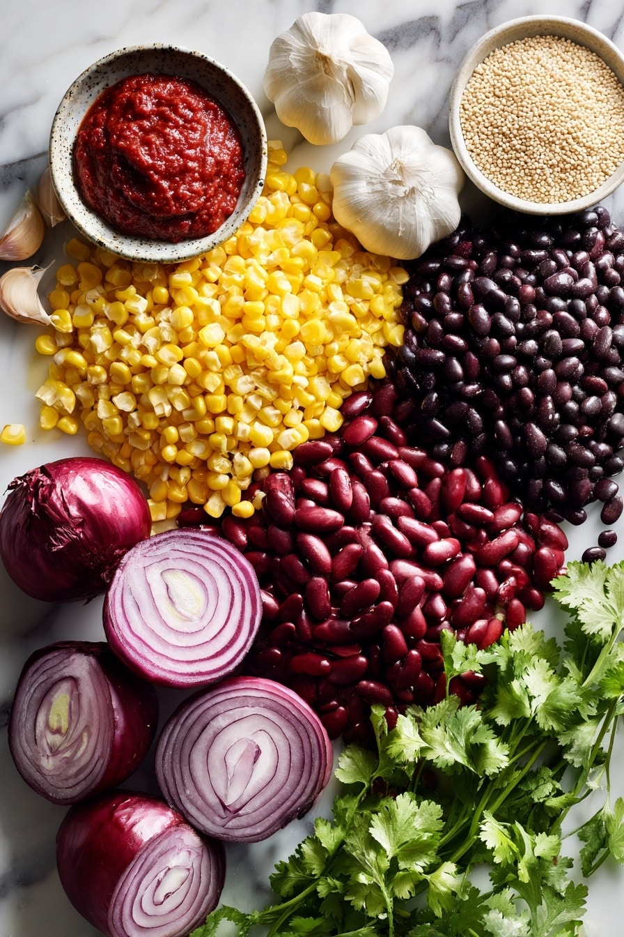 Flat lay of vibrant red onion halves, bright yellow corn kernels, shiny red kidney beans, deep black beans, fluffy dry quinoa grains, peeled garlic cloves, fresh green cilantro sprigs with leaves and stems, and a small dish of rich red tomato paste, all beautifully arranged on a white marble surface, photo taken with an iphone --ar 2:3 --v 7 - Slow Cooker Vegan Bean & Quinoa Chili, vegan chili recipe, plant-based slow cooker chili, healthy vegan chili, hearty vegan chili