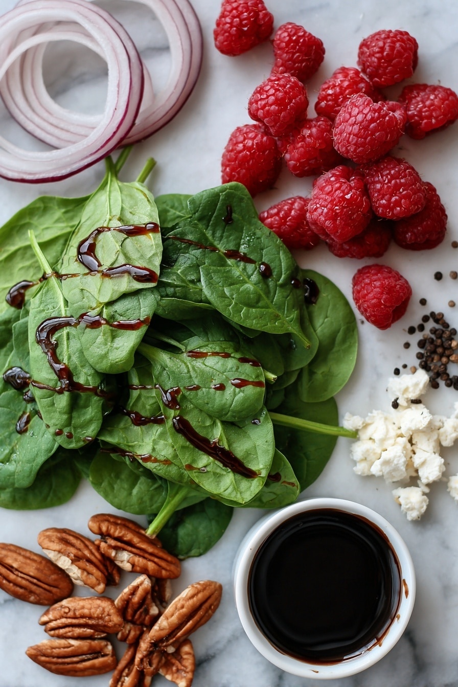 Flat lay of fresh baby spinach leaves, thinly sliced red onion rings, crumbled creamy goat cheese, toasted pecan halves, bright red fresh raspberries, a small pile of coarse black peppercorns, and a drizzle of dark balsamic glaze elegantly spread in a thin line, all beautifully arranged on a white marble surface, photo taken with an iphone --ar 2:3 --v 7 - Spinach Salad with Goat Cheese Raspberries and Toasted Pecans, healthy spinach salad with goat cheese and berries, quick gourmet spinach salad recipe, fresh berry and pecan salad, easy spinach salad with cheese and nuts