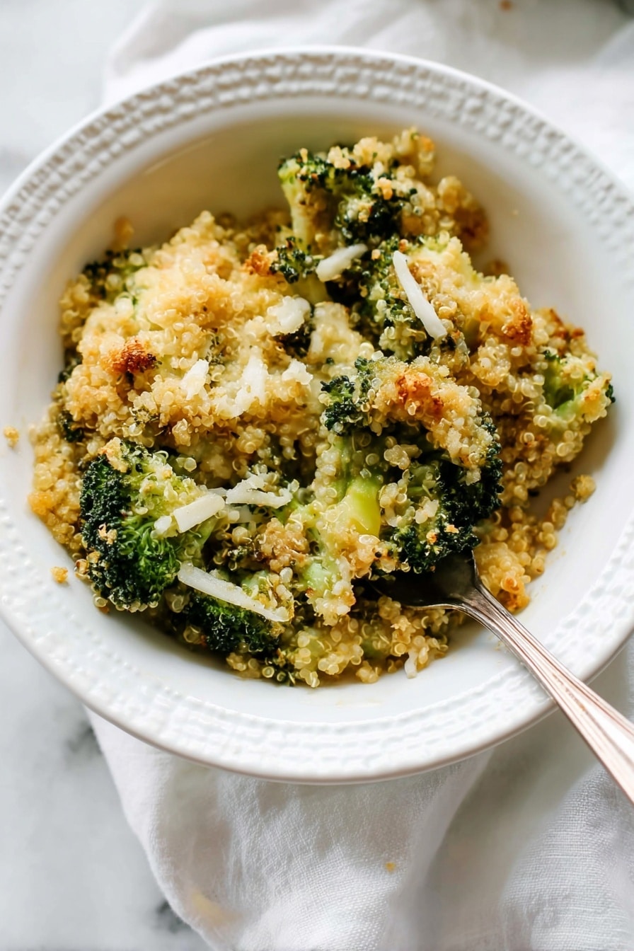A white bowl holds a serving of broccoli quinoa casserole with three visible layers: at the bottom is a soft, light green layer of small broccoli florets, followed by a layer of fluffy beige quinoa mixed with broccoli, and topped with a golden-brown crumbly layer mixed with melted cheese and crispy bits. A silver fork pierces into the top layer, lifting a piece of broccoli covered with the crunchy topping. In the background, a white casserole dish with more broccoli quinoa bake is partially visible on a white marbled surface with some crumbs scattered around. Photo taken with an iphone --ar 2:3 --v 7 - Better Broccoli Casserole, broccoli casserole with cheese, healthy broccoli bake, easy broccoli side dish, cheesy quinoa broccoli casserole