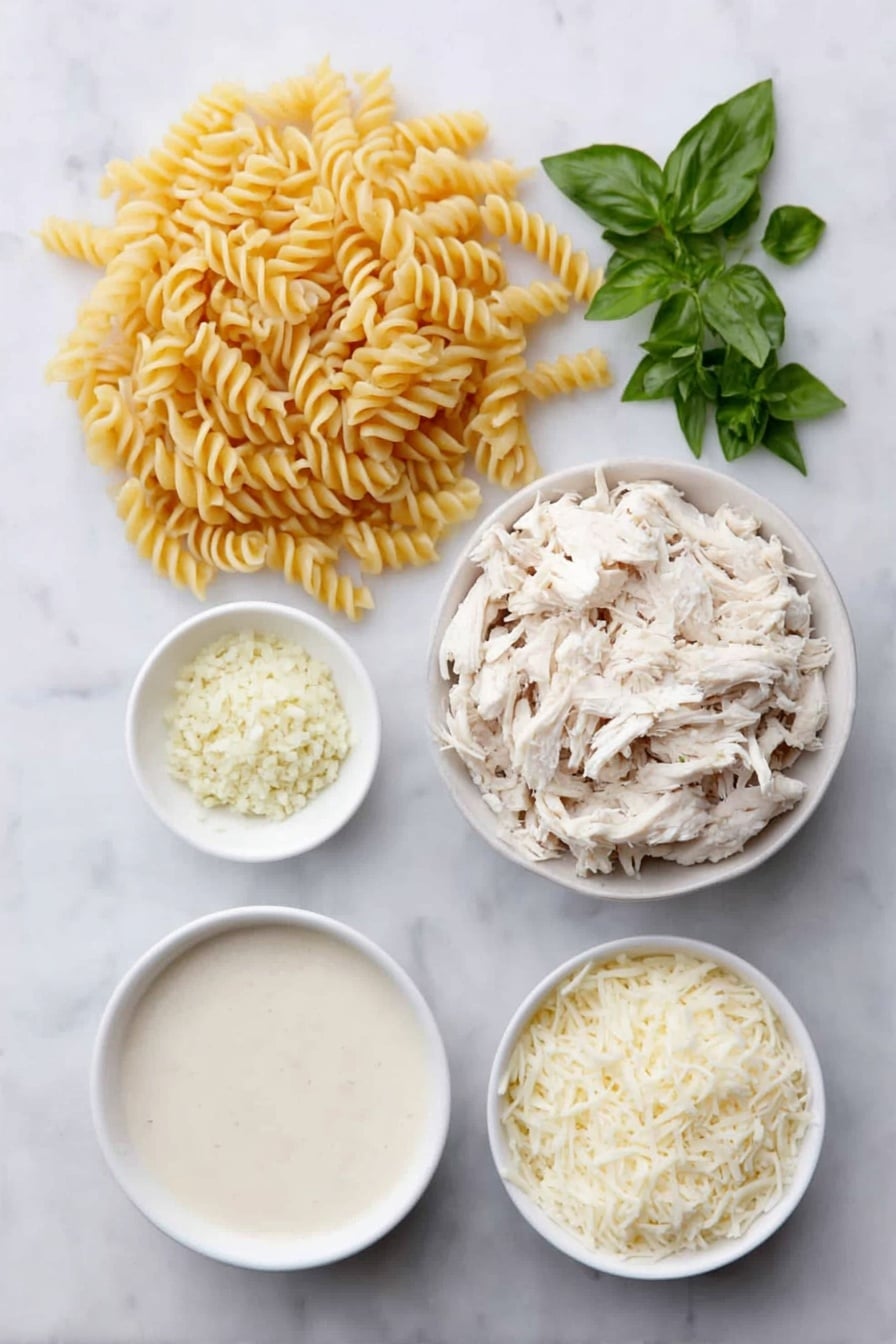 Flat lay of uncooked rotini pasta in a small heap, a few pieces of shredded rotisserie chicken piled neatly, a small white bowl filled with creamy Alfredo sauce, a small white bowl holding chicken stock, a small white bowl with finely minced garlic, a small white bowl heaped with shredded mozzarella cheese, a small white bowl containing grated Parmesan cheese, and a few sprigs of fresh basil, oregano, and parsley arranged symmetrically, all placed on a clean white marble surface, soft natural light, photo taken with an iPhone, professional food photography style, fresh ingredients, white ceramic bowls, no bottles, no duplicates, no utensils, no packaging --ar 2:3 --v 7 --p awthu7i m7354615311229779997 - Easy Chicken Alfredo Casserole, creamy chicken pasta bake, cheesy chicken casserole, easy weeknight dinner recipes, one-dish chicken casserole