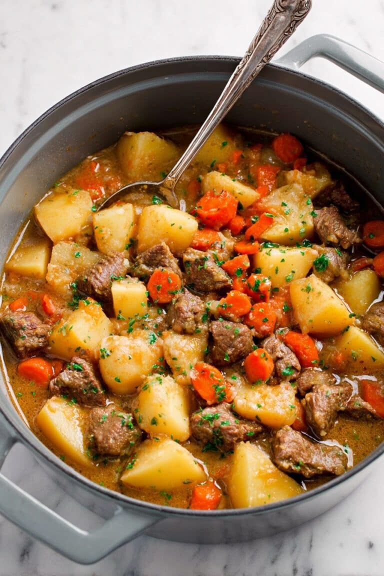 Hearty Braised Lamb Stew with Potatoes, Carrots, and Mushrooms Recipe