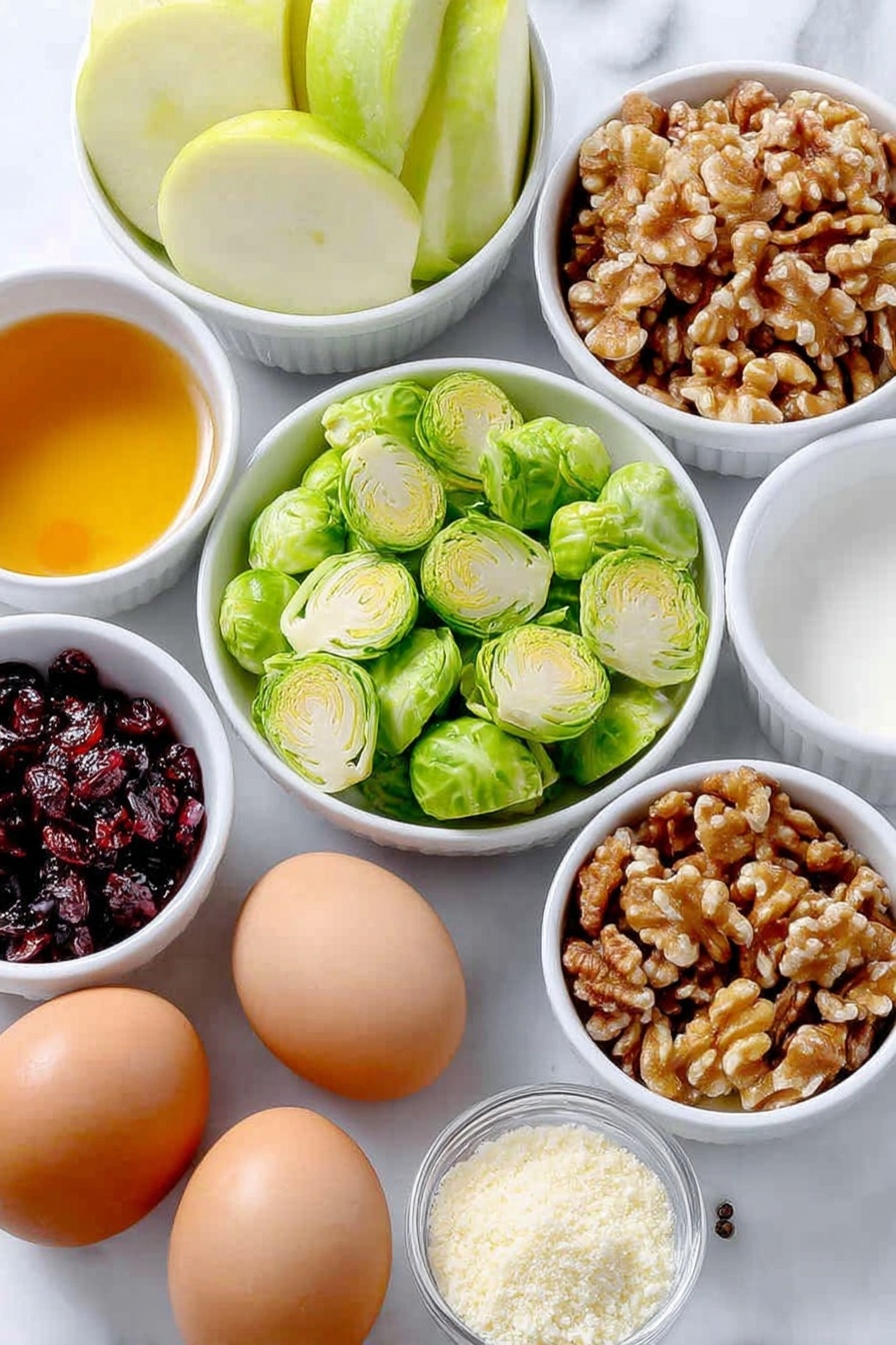 Flat lay of thinly sliced bright green Brussels sprouts, a crisp green Granny Smith apple sliced into matchstick pieces, a small pile of thinly sliced green onion rounds, a handful of plump dried cranberries, chopped toasted walnuts with rich browns and golden hues, a small white ceramic bowl with pale amber apple cider vinegar, a small white ceramic bowl with golden extra virgin olive oil, a small white ceramic bowl with deep amber pure maple syrup, a small white ceramic bowl filled with fine grated off-white Pecorino Romano cheese, two whole eggs with clean brown shells, coarse salt and black peppercorns neatly scattered, all arranged in perfect symmetry on a simple white ceramic plate, placed on a clean white marble surface, soft natural light, photo taken with an iPhone, professional food photography style, fresh ingredients, white ceramic bowls, no bottles, no duplicates, no utensils, no packaging --ar 2:3 --v 7 --p m7354615311229779997 - Crispy Brussels Sprouts Salad with Apples, Brussels Sprouts apple salad, healthy Brussels Sprouts salad, easy Brussels Sprouts side dish, fruit and vegetable salad