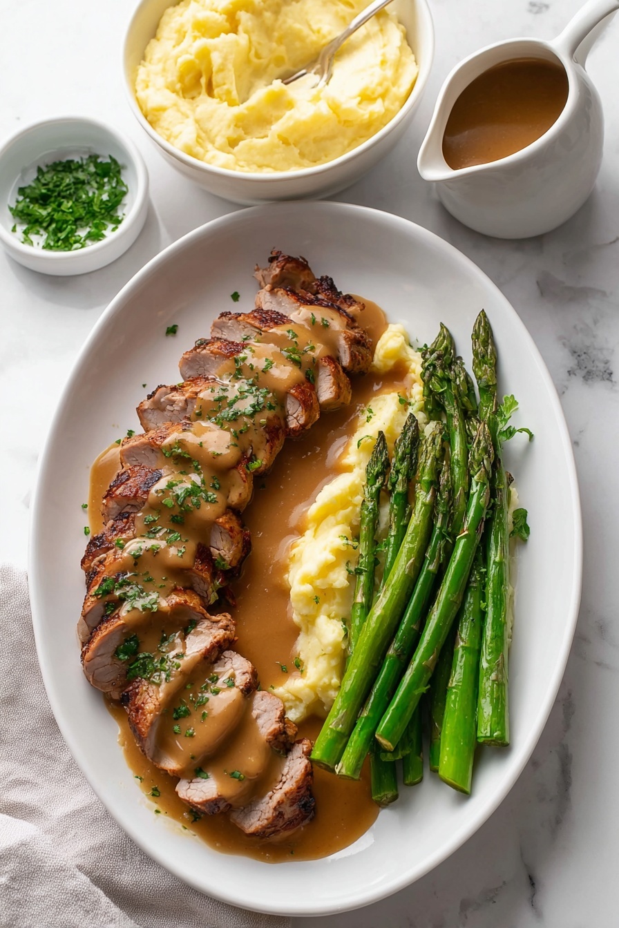 The image shows a white oval plate on a white marbled surface with sliced grilled meat arranged in two rows on the left side. The meat is covered with a smooth brown sauce and sprinkled with chopped green herbs. Next to the meat on the right side are several steamed asparagus spears that are bright green and glossy. Behind the meat and asparagus, there is a white bowl filled with creamy pale yellow mashed potatoes with a slightly uneven smooth surface. In the top left corner on the white marbled surface is a small white bowl with fresh chopped herbs. On the bottom right corner, a white pitcher contains more brown sauce, partially visible. The photo has soft lighting and a clean, fresh presentation style. Photo taken with an iphone --ar 2:3 --v 7 - Easy Garlic Turkey Tenderloin with Gravy, garlic turkey tenderloin, tender turkey recipes, quick turkey dinners, flavorful turkey main dish