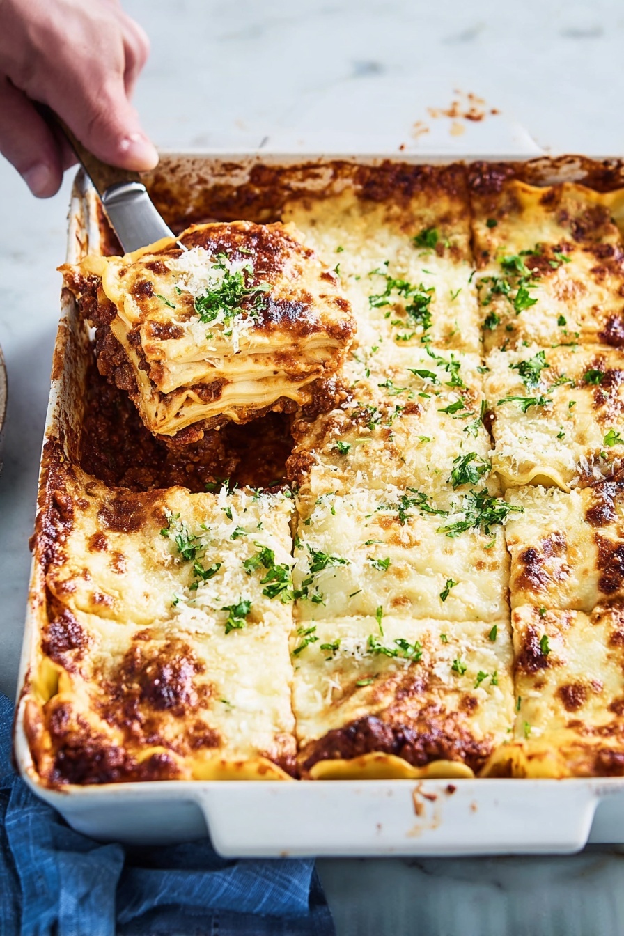 A white rectangular ceramic baking dish holds a layered lasagna with six visible sections. The top layer is melted, golden-brown cheese with some darker browned spots along the edges and sprinkled with fresh green parsley. Underneath the cheese, there are thick, creamy white sauce layers alternating with pasta sheets, visible along the edges where the cheese has browned. Between the pasta layers, a rich dark brown meat sauce with a slightly chunky texture peeks through the sides. A woman's hand is holding a spatula lifting one lasagna piece from the top left corner, showing the thick layers clearly. The dish rests on a white marbled surface with a blue cloth partially visible on the side photo taken with an iphone --ar 2:3 --v 7 - Zucchini Lasagna, healthy zucchini lasagna, low-carb lasagna, homemade zucchini lasagna, gluten-free zucchini lasagna