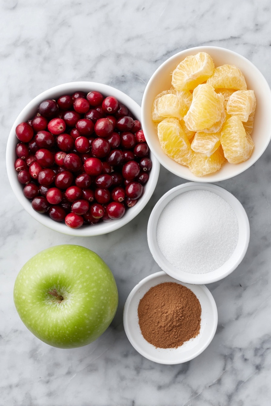 Flat lay of fresh whole cranberries, a small whole navel orange cut into chunky pieces showing its bright peel and juicy segments, a whole Granny Smith apple quartered with crisp green skin, a small white ceramic bowl filled with white granulated sugar, and a tiny white ceramic bowl containing warm brown ground cinnamon, all arranged in perfect symmetry on a clean white marble surface, soft natural light, photo taken with an iPhone, professional food photography style, fresh ingredients, white ceramic bowls, no bottles, no duplicates, no utensils, no packaging --ar 2:3 --v 7 --p m7354615311229779997 - Easy Cranberry Orange Relish, holiday side dish with cranberries and orange, simple festive relish recipe, quick cranberry orange relish, vibrant holiday condiment