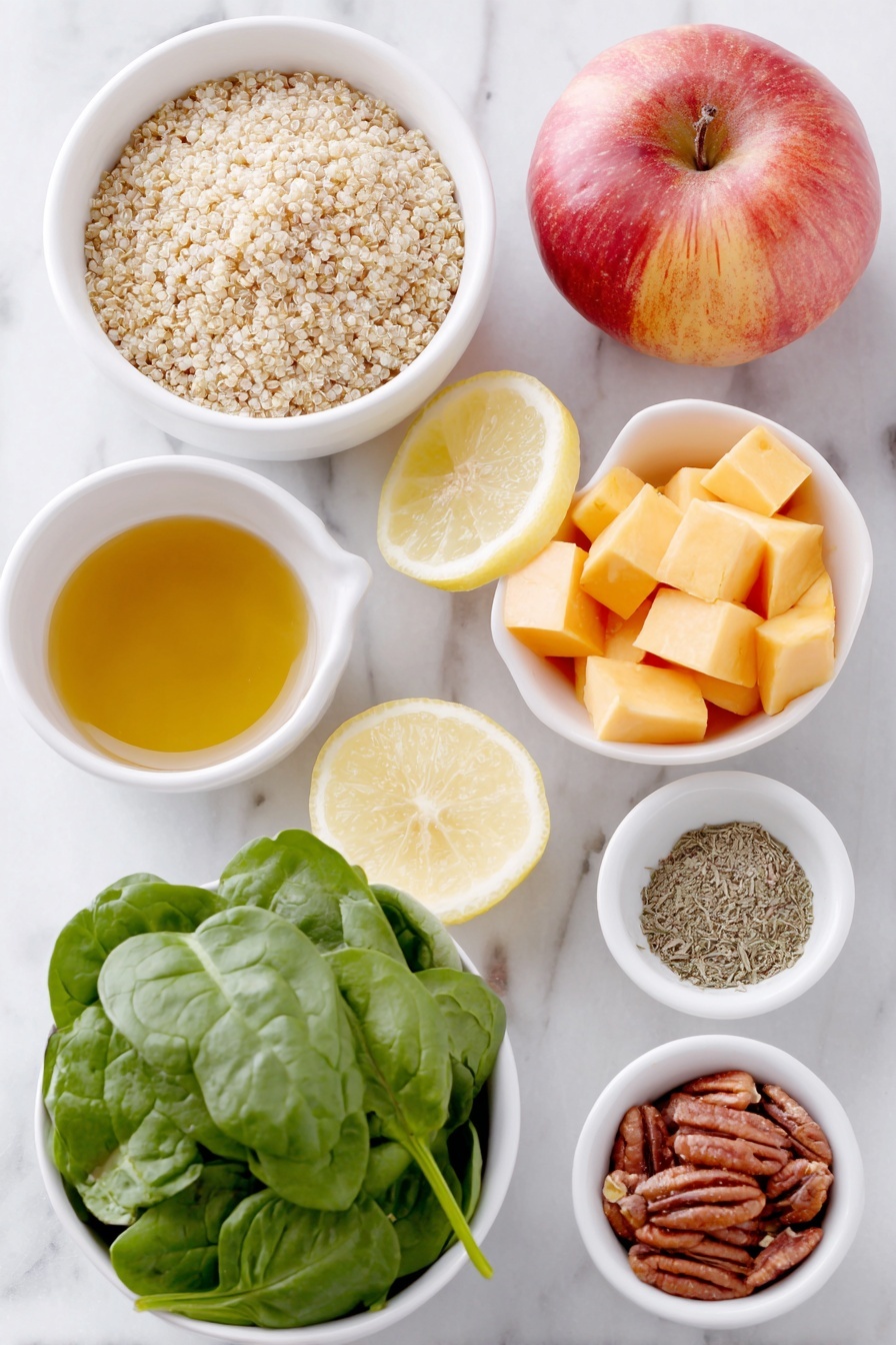 Flat lay of dry quinoa grains in a small white ceramic bowl, cubed bright orange butternut squash pieces in a simple white bowl, fresh vibrant green spinach leaves loosely arranged beside the bowls, a whole medium red and yellow apple sliced to show its crisp interior on a white ceramic plate, cooked beige chickpeas placed in a small white bowl, roughly chopped toasted pecans in another white bowl, a small white bowl containing golden olive oil, a small white bowl filled with pale amber apple cider vinegar, a small white dish holding fresh lemon juice, a tiny white bowl with a drizzle of maple syrup, and a pinch of ground cinnamon and dried sage each sprinkled neatly on separate small white dishes, all ingredients fresh and natural, arranged with perfect symmetry and realistic proportions, placed on a clean white marble surface, soft natural light, photo taken with an iPhone, professional food photography style, fresh ingredients, white ceramic bowls, no bottles, no duplicates, no utensils, no packaging --ar 2:3 --v 7 --p m7354615311229779997 - Roasted Butternut Squash Quinoa Salad, fall quinoa salad, healthy roasted veggie salad, vegan quinoa salad, cozy fall salad