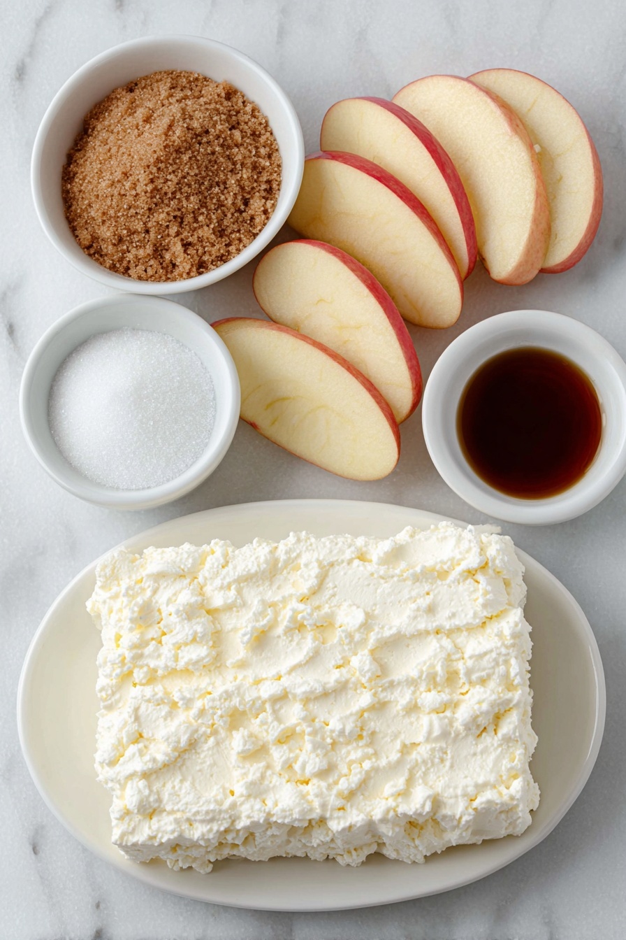 Flat lay of a block of softened cream cheese on a simple white ceramic plate, a small white bowl filled with packed brown sugar, another small white bowl containing granulated white sugar, a small white bowl with clear vanilla extract, and several fresh, crisp apple slices arranged neatly on a simple white ceramic dish, all ingredients fresh and natural, perfect symmetry, balanced layout placed on a clean white marble surface, soft natural light, photo taken with an iPhone, professional food photography style, fresh ingredients, white ceramic bowls, no bottles, no duplicates, no utensils, no packaging --ar 2:3 --v 7 --p m7354615311229779997 - Caramel Apple Dip, easy caramel apple dip, creamy caramel apple dip, classic fall snacks, apple dip for parties