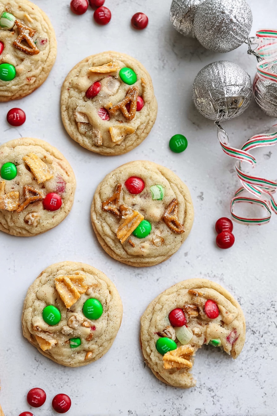 There are six round cookies arranged on a white marbled surface, each with a light golden-brown color and a soft, slightly bumpy texture. Each cookie has colorful red and green candy pieces embedded on top, along with small broken pretzel pieces and a few wavy potato chip slices. One cookie is partially eaten, showing a soft inside with candy and pretzel pieces. Around the cookies, there are scattered red and green candies, and near the top right corner, there are two large silver jingle bells with a striped ribbon. The whole scene is bright and festive, with a cozy holiday feel. photo taken with an iphone --ar 2:3 --v 7 - Santa's Trash Cookie, trash cookies recipe, holiday cookie recipes, sweet salty cookie ideas, fun festive cookies
