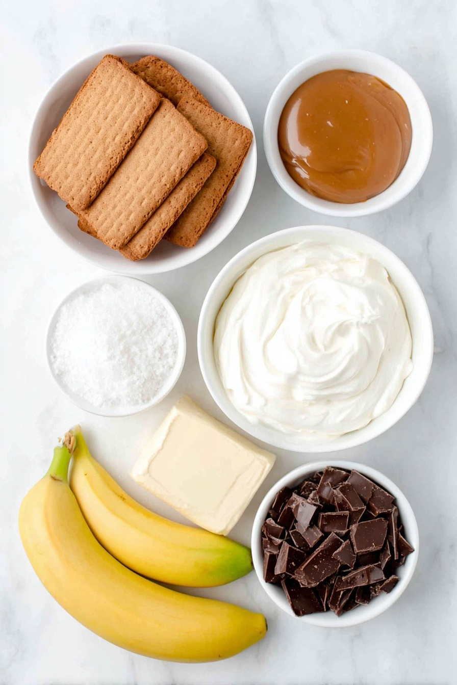 Flat lay of a small white ceramic bowl filled with golden brown whole digestive biscuits, a small white ceramic bowl with melted unsalted butter shining softly, a small white ceramic bowl holding thick golden caramel sauce, two whole ripe bananas with smooth yellow skin beside a few banana slices neatly arranged, a small white ceramic bowl filled with thick double cream, a small white ceramic bowl containing fine white icing sugar, a small white ceramic bowl showcasing delicate dark chocolate curls, all ingredients fresh and natural, perfectly balanced and symmetrical, placed on a clean white marble surface, soft natural light, photo taken with an iPhone, professional food photography style, fresh ingredients, white ceramic bowls, no bottles, no duplicates, no utensils, no packaging --ar 2:3 --v 7 --p m7354615311229779997 - No-Bake Banoffee Pie, Banoffee Pie without oven, Easy Banoffee Dessert, No-Bake Pie Recipes, Caramel Banana Pie