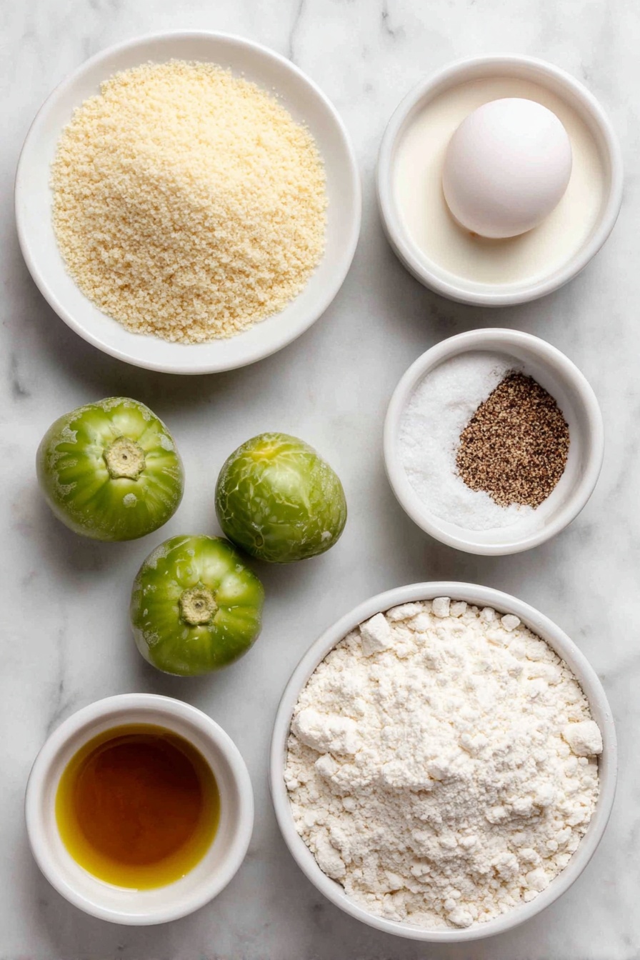 Flat lay of three small to medium fresh whole green tomatoes, a small mound of pale yellow cornmeal on a white ceramic plate, a small heap of fine dry golden breadcrumbs on a white ceramic plate, a small pile of white all-purpose flour mixed with coarse salt crystals on a white ceramic plate, a single large whole egg with a clean shell, a small white ceramic bowl containing pale buttermilk, a small white ceramic bowl with a mix of ground black pepper and salt, a small white ceramic bowl filled with clear golden vegetable oil all arranged symmetrically and balanced, placed on a clean white marble surface, soft natural light, photo taken with an iPhone, professional food photography style, fresh ingredients, white ceramic bowls, no bottles, no duplicates, no utensils, no packaging --ar 2:3 --v 7 --p m7354615311229779997 - Fried Green Tomatoes, Southern Fried Green Tomatoes, Crispy Green Tomatoes, How to Make Fried Green Tomatoes, Green Tomato Appetizer